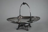 Meriden Britannia Silver Plate Co. Four-Legged Bridal Basket, Connecticut, with Silver Storage Cloth