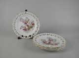Set of Four Reticulated Porcelain Floral Design Plates with Gilt Scalloped Edge