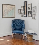 Contemporary Tufted Blue Leather Wing Chair with Brass Nailhead Trim and Caster Feet
