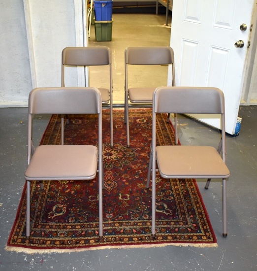 Four Beige Metal Folding Chairs with Padded Seats