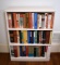 Vintage White Wooden Bookshelf with Books