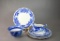 Lot of Seven Antique Flow Blue Dishes: Five W H Gridley Plates, R&M Co Cup, & Other Creamer
