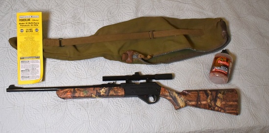 A Daisy Powerline Model 35 BB/.177 Cal. Rifle, Daisy 4 x 15 Scope, Camo Stock & Sleeve & 6000 Ct.