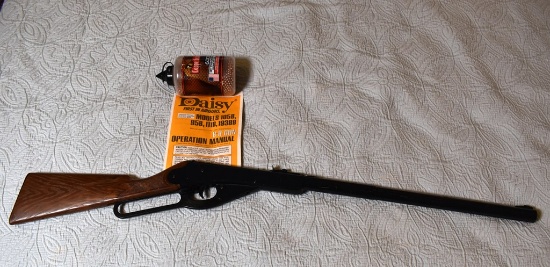 A Daisy Model 111B Carbine BB Gun with Operation Manual and 6000 Count Copperhead Ammo Bottle