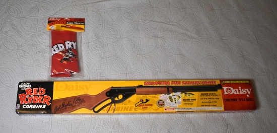 A Daisy Red Ryder BB Gun Kit (NIB) & Gun Sleeve