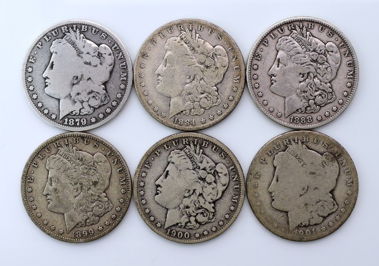 Six Morgan Silver Dollars: 1879, 1884-O, 1888, 1899-O, 1900-O, 1901-O