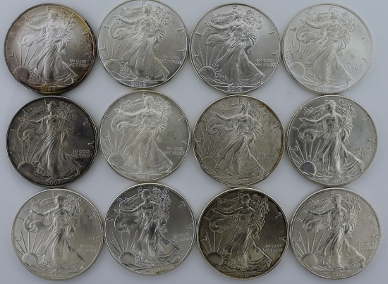 12 BU American Eagle 1 Oz. Fine Silver Coins (2004, 2006 – 2, 2007 – 2, 2009, 2010, 2011 – 5)