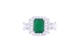 Opulent Ribbon Emerald & Diamond Platinum Ring