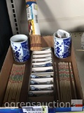 Oriental cups, bamboo mat, chopsticks and chopstick rests