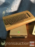 Vintage Commodore 64 keyboard and Commodore 1541 floppy drive unit