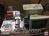 Vintage computer tower, monitor and keyboard & discs and misc. books
