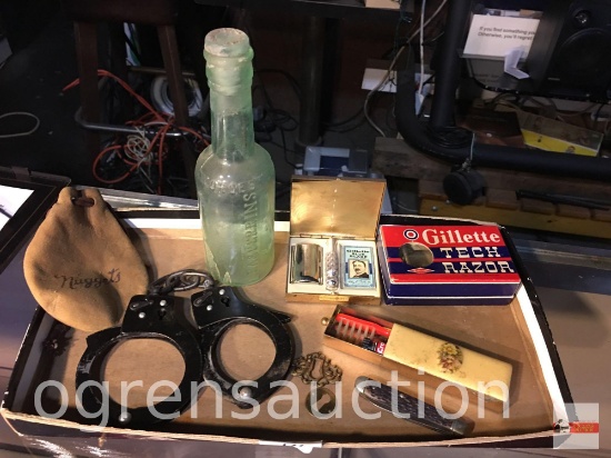 Collectibles - handcuffs, bottle, Gillette Razor, pocket knife, travel toothbrush kit etc.