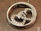 Jewelry - sterling, necklace w/floating hearts pendant, writing on rim