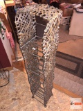 Woven and metal storage rack