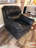 The Leather Factory custom upholstered black club chair with detachable cushion, 2 front wheels