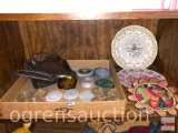 Vintage kitchen - glass canning jar lids, ornate metal crumb butler, calendar plates