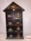 Wooden display shelf with 8 hand painted miniature pottery