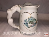 Asian porcelain mug with nude handle and lips rim