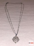 Jewelry - Necklace with jeweled pendant