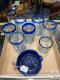 Glassware - 10 blue handblown glasses and blue pottery reamer