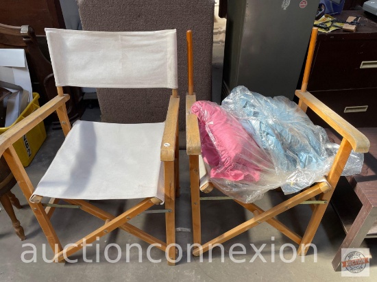 2 director style folding chairs ( 1 missing back material) and 2 throw pillows
