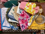 Kitchen towels, gloves, scrubbers, aprons, hot pads etc.