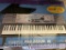 Yamaha Electric Keyboard Portatone Portable Grand Touch Response in box with stand