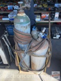 2 Acetylene tanks and lg. wheeled cart w/ hoses, torch, goggles, sticker gauges, no paperwork