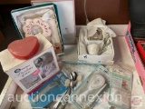 Baby items - Breast pump kit in box, medicine spoon, spoons, safety outlet caps, comb/brush set in p