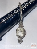 Woman's wrist watch - Wittnauer, Swiss, 14k white gold, 8 diamonds around bezel w/50+ miner's chip