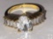 Jewelry - Ring, .925 sterling fashion ring w/ lg. solitaire and 10 baguette cut clear stones