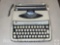 Smith-Corona Zephry Deluxe manual typewriter in storage/carry case
