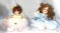 Dolls - 2 - Porcelain signed and numbered, sitting