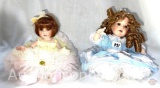Dolls - 2 - Porcelain signed and numbered, sitting