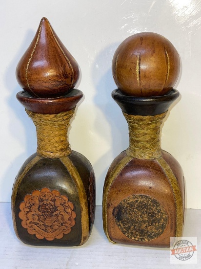 2 Mid Century Italian hand tooled leather wrapped wine decanters