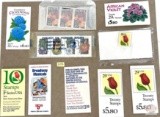 Stamps - 9 packages and 1 pin - Total of approximately $45 Commemorative and Definitive stamps