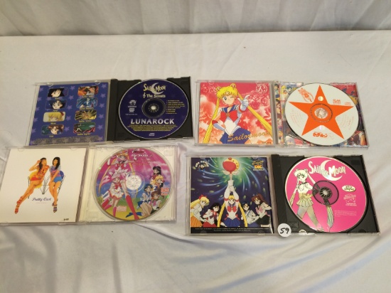 Lot of 4 Pieces Collector Sailor Moon Dics - See Pictures