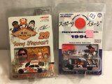 Lot of 2 NIP Collector Action Racing Assorted Die Cast Cars 1:64 Scale