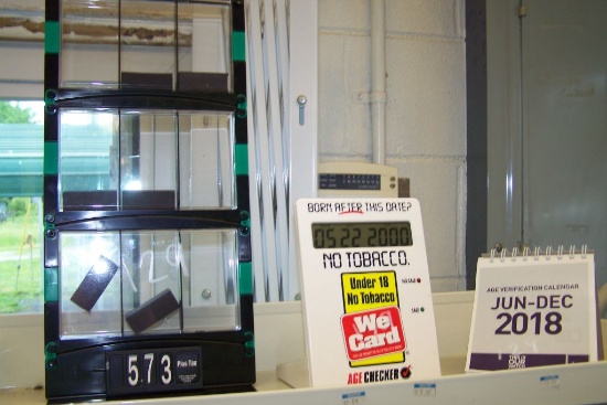 AGE IDENTIFICATION CLOCK AND CALENDAR, CIGARETTE DISPLAY