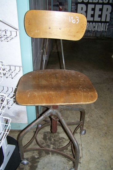 WOODEN CHAIR ON WHEELS