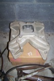 ALUMINUM MANIFOLD COVER, YEAR UNKNOWN