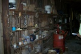 WALL FULL OF MISC ITEMS INSIDE SHED EAST SIDE