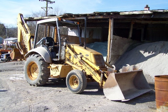 1997 FORD NEW HOLLAND 555E BACKHOE, 2WD, OPEN CANOPY, HOURS SHOWING: 3640,