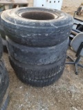 10.00-20 TIRES AND RIMS (4)