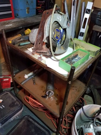 TOOL STAND W/ SKIL SAW, GREASE GUN, AND EXTENSION CORDS