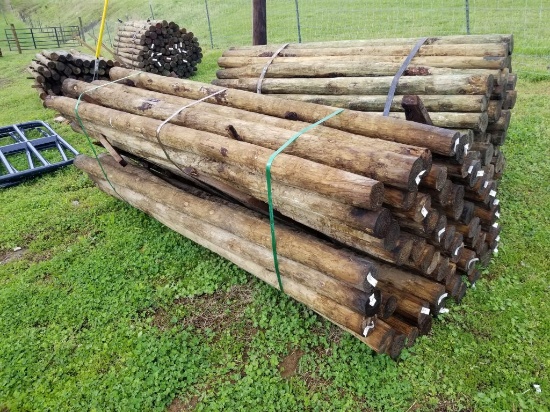 3 1/2" - 4" X 8' TREATED WOOD POSTS (55)