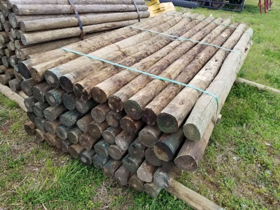 3 1/2" - 4" X 8' TREATED WOOD POSTS (55)