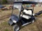 BLACK AND WHITE 4 SEATER GOLF CART, NO CHARGER, HAS BATTERIES