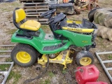JOHN DEERE X320 LAWN MOWER, HOURS SHOWING: 869, 48