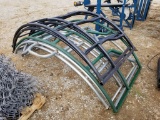 STACK OF DAMAGED HAY RINGS